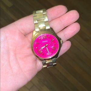 Pink fossil gold watch